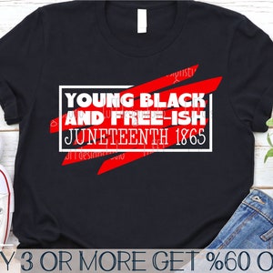 May include: Black t-shirt with a red graphic that says "Young Black and Free-ish Juneteenth 1865".