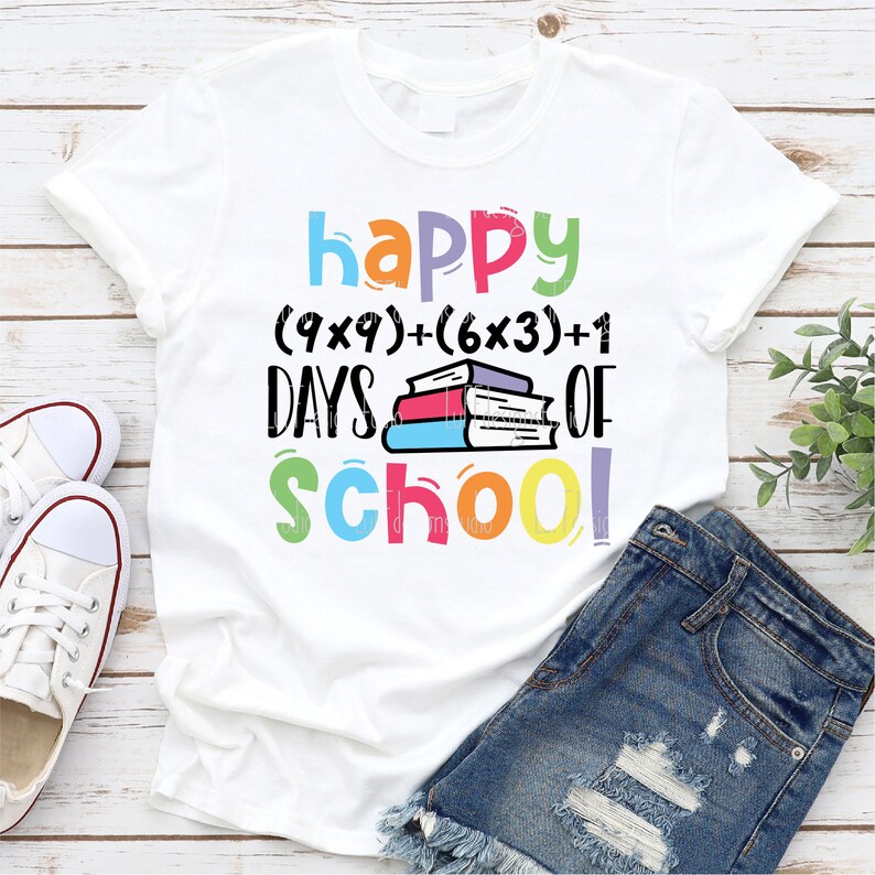May include: White t-shirt with a colorful graphic that says "happy (9x9)+(6x3)+1 days of school!" with a stack of colorful books.
