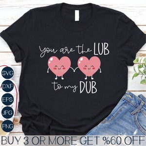 May include: Black t-shirt with a pink heart design and the text "You are the LUB to my DUB".