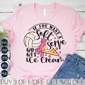May include: Pink t-shirt with a black and white graphic of a volleyball and ice cream cone. The text on the graphic reads "If you want a soft serve go get ice cream".