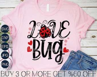 May include: Pink t-shirt with a black and red graphic that says "Love Bug" with a ladybug in the middle of the word "Love".