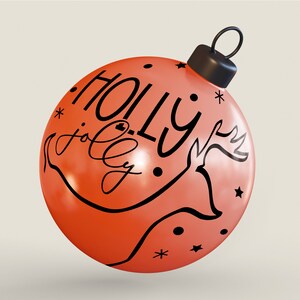 May include: A red Christmas bauble with a black reindeer and the words "Holly jolly" written on it.
