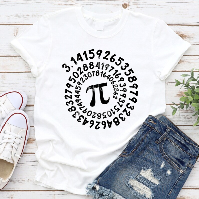 May include: White t-shirt with a black circle design featuring the mathematical constant pi and the digits of pi in a spiral pattern.