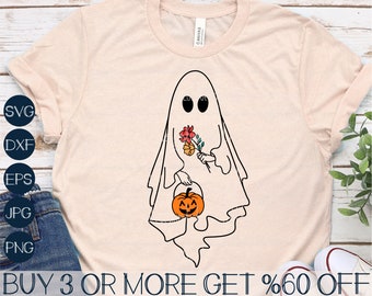 May include: A white ghost holding a pumpkin and flowers. The ghost is outlined in black and has two black eyes. The background is a light pink t-shirt. The text "BUY 3 OR MORE GET %60 OFF" is at the bottom of the image.