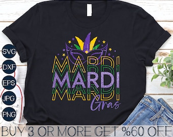 May include: A black t-shirt with a purple, green, and yellow Mardi Gras design. The design features a mask and the text "Mardi Gras".