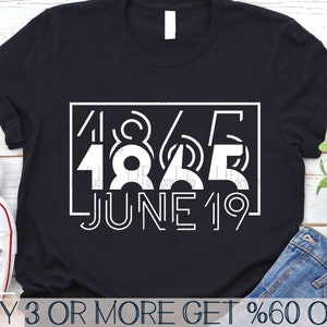 May include: Black t-shirt with white text that reads "1985 JUNE 19". The text is in a bold, geometric font.