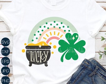 May include: A white t-shirt with a green shamrock, a pot of gold with the word "Lucky" on it, and a rainbow with a yellow sun.