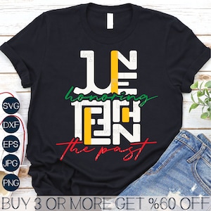 May include: A black t-shirt with a graphic design that says "Juneteenth honoring the past" in white, yellow, red, and green letters.
