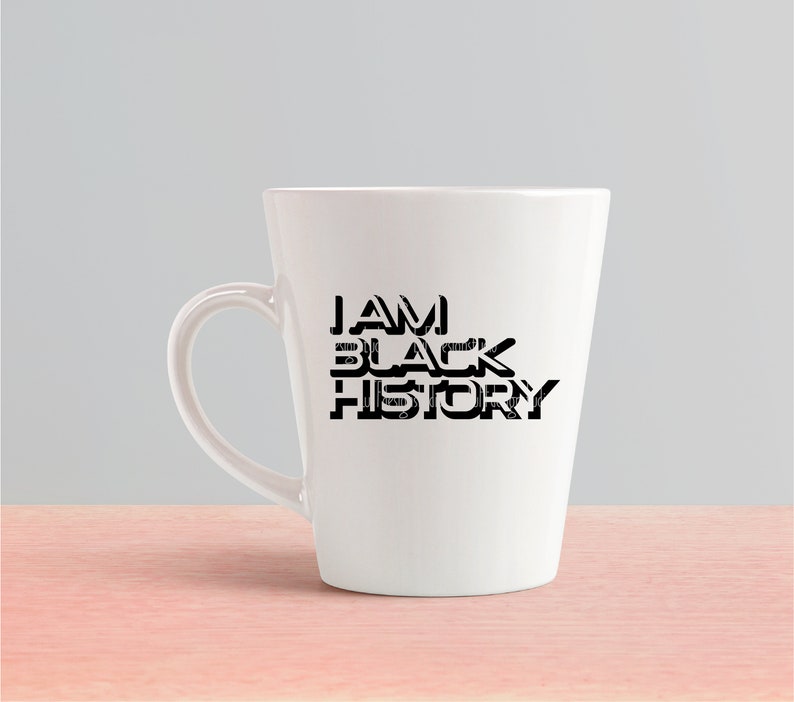 May include: White ceramic coffee mug with a black graphic that reads "I AM BLACK HISTORY".