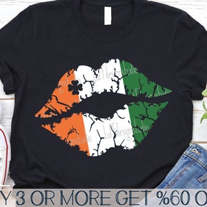 May include: A black t-shirt with a white outline of a pair of lips in the shape of the Irish flag. The lips are green, white, and orange. The text "BUY 3 OR MORE GET %60 OFF" is at the bottom of the image.
