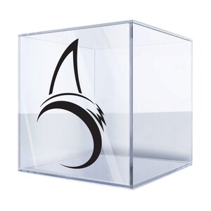 May include: A clear acrylic display case with a black shark fin and wave graphic on the front.
