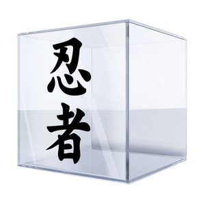 May include: A clear acrylic cube with the Japanese characters "Consider" and "Author" printed on the front.