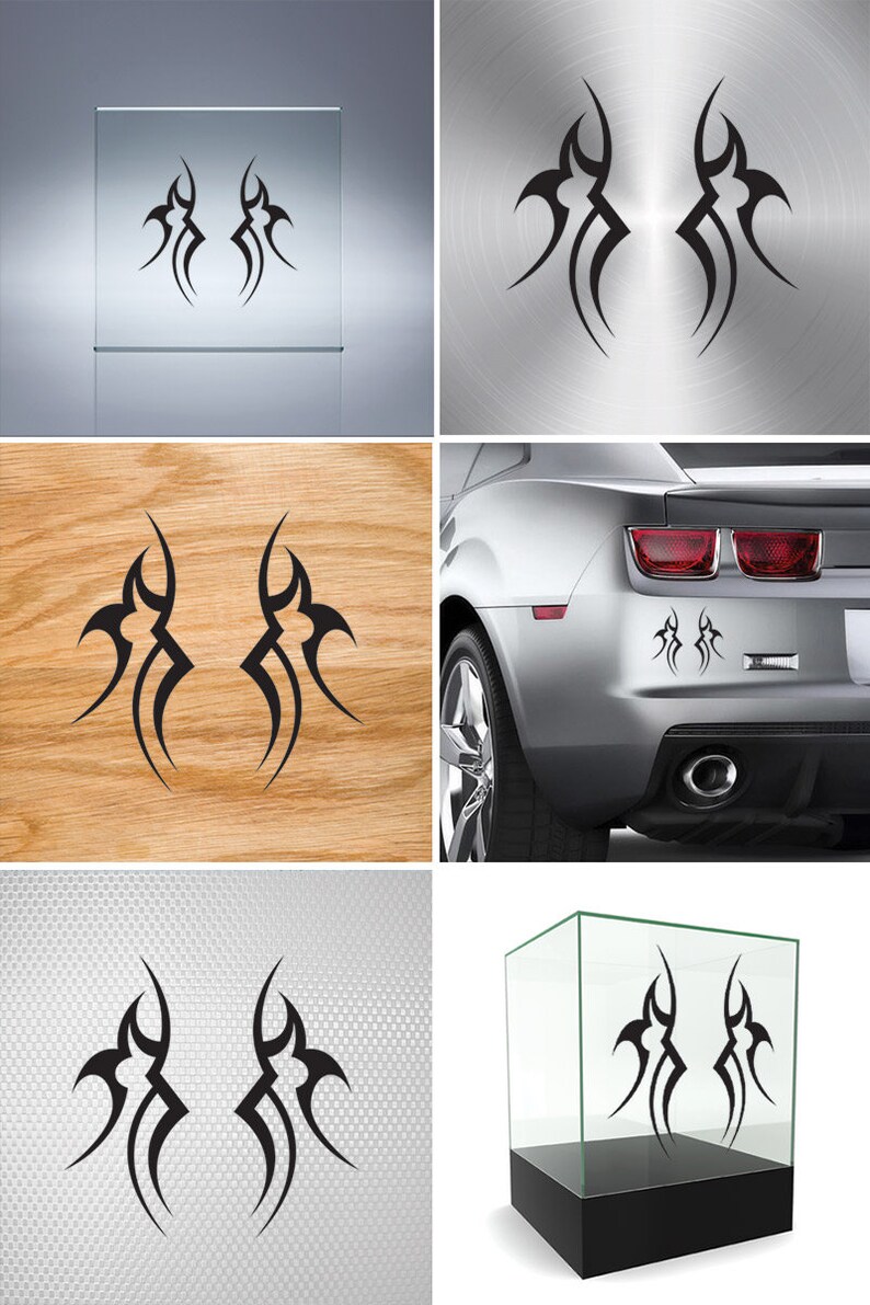 May include: Two black tribal-style decals, each with a unique design, are shown on different surfaces, including a glass display case, a car, and a wooden surface. The decals are symmetrical and feature sharp, angular lines.