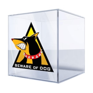 May include: A clear acrylic display box with a yellow warning sign that says "Beware of Dog". The sign features a black and brown dog with a red spiked collar.