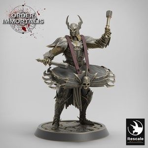 May include: A detailed miniature figurine of a warrior in black and gold armor, holding a hammer and a shield with a skull emblem. The figurine is standing on a circular base with the words "ORDER OF IMMORTALIS" in the background.