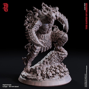 May include: A detailed, gray, 3D printed miniature of a demonic creature with horns, claws, and a skull-like face. The creature is standing on a base with skulls and candles. The text "THE GATES OF DESPAIR" is visible in the upper right corner of the image.