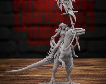 May include: A gray miniature figurine of a warrior riding a dinosaur. The warrior wears armor and a helmet, holding a tall banner with a winged emblem. The dinosaur has a saddle, reins, and a long tail, standing on a circular base.