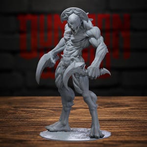 May include: A gray, unpainted miniature figurine of a muscular, humanoid creature with a crested head, sharp fangs, and claw-like hands. The figure stands on a circular base, featuring detailed musculature and a menacing posture with curved blades.