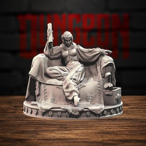 May include: A gray resin miniature figurine of a seated figure wearing a headpiece, a cropped top with dangling coins, and loose trousers. The figure holds a scroll in one hand while resting on an ornate, draped chair with a small chest nearby.