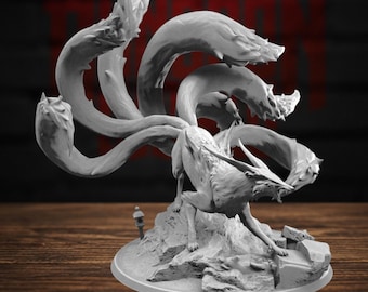 May include: A grey, unpainted resin miniature of a nine-tailed fox creature standing on a rocky base. The fox has pointed ears, a snarling expression, and multiple long, flowing tails that arch upwards and outwards behind its body.