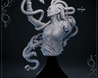 May include: A gray resin bust of a figure with snakes for hair and a snake coiled around one raised arm. The figure has textured skin patches on the face and neck, wearing a draped garment. The text 101MM, MAMMOTH FACTORY, and MEGORGA BUST are visible.