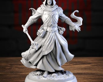 May include: A light gray miniature figurine of a hooded figure wearing ornate armor and robes. The figure holds a mace in the right hand, features a belt with pouches, and stands on a circular base decorated with small skulls and debris.