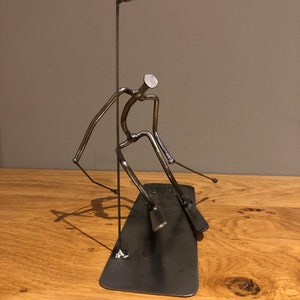Downhill skier, skiing metal sculpture, slalom skier, skiing, welded skiing art, ski gift, winter sports.