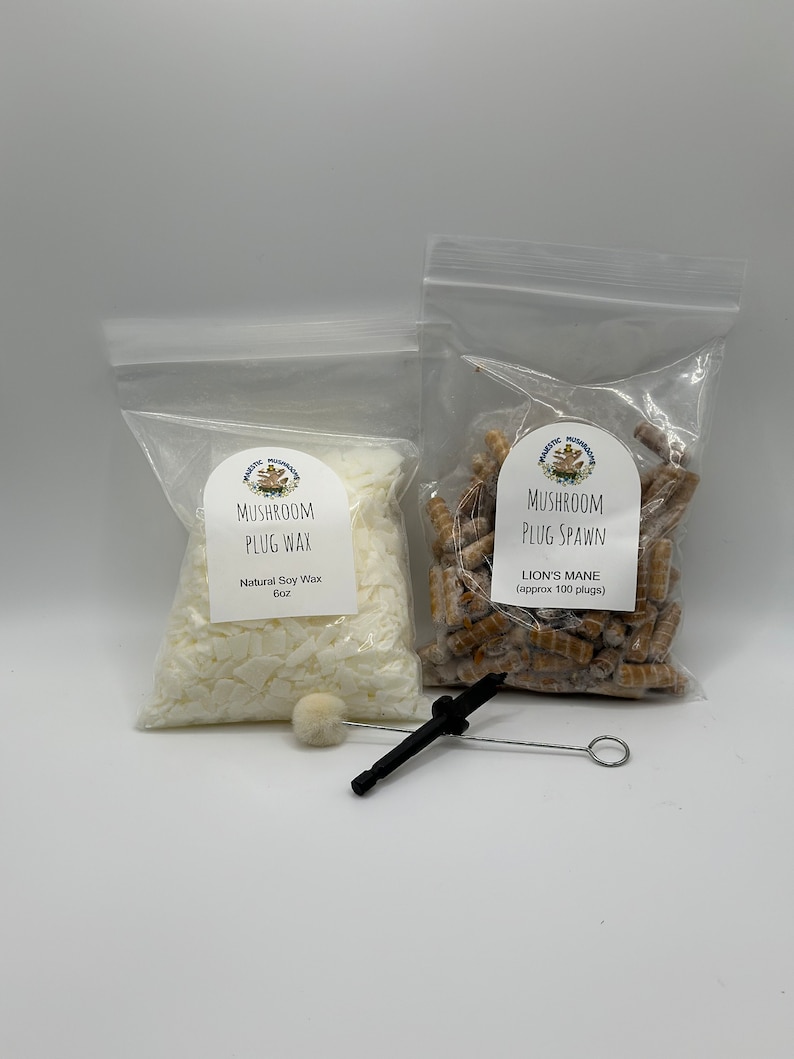 May include: Two clear plastic bags containing mushroom growing supplies. One bag contains white soy wax and the other contains brown mushroom plugs. The bags are labeled "Mushroom Plug Wax" and "Mushroom Plug Spawn Lion's Mane (approx 100 plugs)".