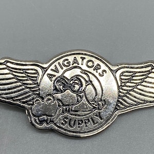 Vintage Disney’s Pleasure Island Avigators Supply keychain, pre-2000