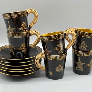 Maruni Lacquerware made in Occupied Japan demitasse cup and saucer 12 piece set, black, metal base, greek key pattern, pagoda