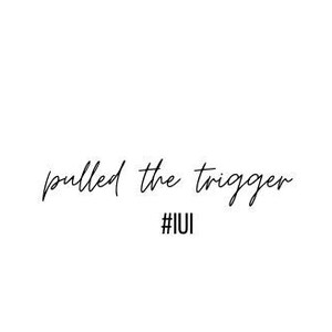 May include: White background with the phrase "pulled the trigger" in a cursive font. Below the phrase is the hashtag "#IUI" in a sans-serif font. The text is in black.