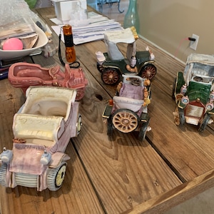 total (5) five decorative and collectable porcelain cars circa 1950&#39;s all for one money. Signed Japan