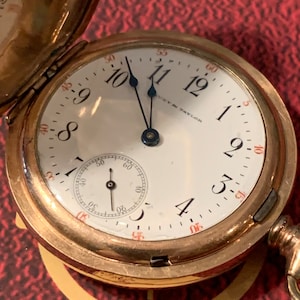 Ca 1900&#39;s Hunters pocket watch size12 lever set Gold filed warranted 25 years tria color by high end retail house by Ludy & Taylor