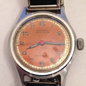 DELBA Swiss Made Military watch ca 1940 with Art Deco Rare expandable leather and S/S band SERVICED