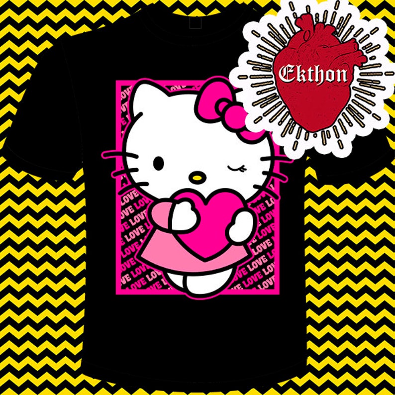 May include: Black t-shirt featuring a pink framed image of Hello Kitty holding a pink heart. The background is a yellow and black chevron pattern. The text "LOVE" is repeated in pink around the image. The text "Ekthon" is in white on a red heart.
