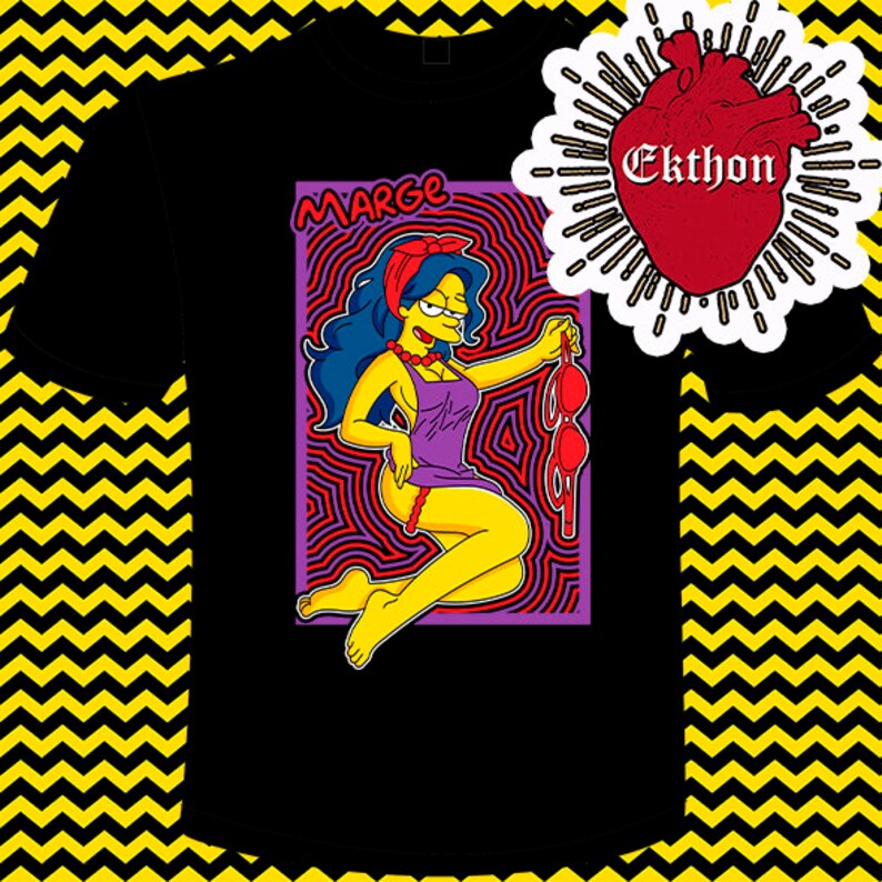 May include: Black t-shirt featuring a colourful illustration of Marge Simpson wearing a purple dress and red bra. The illustration is surrounded by a psychedelic pattern. The text "MARGE" is above the illustration. The text "Ekthon" is in a red heart shape in the top right corner.