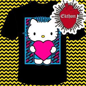 May include: Black t-shirt featuring a blue and pink Hello Kitty graphic holding a pink heart. The graphic is surrounded by the word "LOVE" repeated in pink and blue. The text "Ekthon" is in white on a red heart with a white outline.