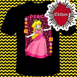 May include: Black t-shirt featuring a pink and yellow cartoon image of Princess Peach from the Super Mario Bros. video game series. The image is surrounded by a pixelated border with the word "PEACE" and the word "LOVE" repeated multiple times. The text "Ekthon" is in a red heart-shaped speech bubble in the top right corner.