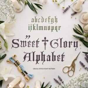 May include: A cross stitch font pattern on white fabric featuring the lowercase alphabet in green and the text Sweet Glory Alphabet in dark purple. The design includes two skeins of embroidery floss, gold scissors, and white flowers.