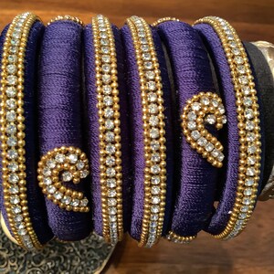Dark blue 6 piece  Indian silk thread bangles w/ stonework.