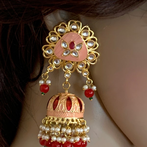 Golden jhumki in tops pink lakh  red stone and hanging white pearl and kundan in jhumki red and green tiny and white moti red meenakari