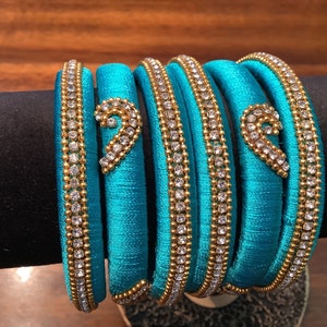 Handmade teal reshmi silk thread bangles w/ stonework.size 2.8