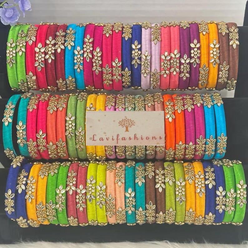 Handmade silk thread bangles in assorted colors for Indian weddings, festivals, saree matching, bridal jewelry, and gifting.