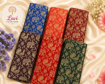 May include: Five rectangular fabric swatches featuring a repeating gold pattern of elephants and peacocks. The colors include royal blue, bright red, deep maroon, dark purple, and forest green. A circular logo with the text Lavi Fashions is visible.