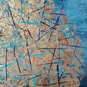 May include: Abstract painting with a textured canvas. The artwork features a gold-colored central area with blue and black lines and splashes. The background is a gradient of blue hues, creating a dynamic and textured visual effect.