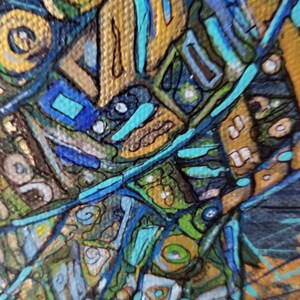 May include: Abstract painting with a close-up view. The artwork features a mix of geometric shapes and organic forms in shades of blue, green, gold, and brown. The texture appears to be canvas, with visible brushstrokes and a textured surface.