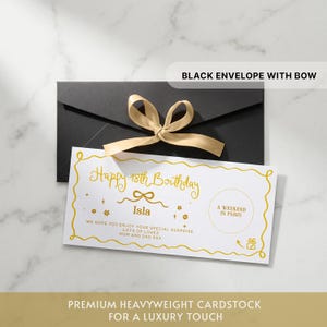 May include: A black envelope with a gold ribbon bow and a white rectangular gift voucher featuring gold text that reads Happy 18th Birthday, Isla, A WEEKEND IN PARIS, and We hope you enjoy your special surprise, lots of loves, Mum and Dad.