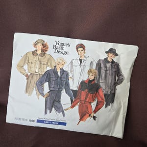 May include: A white Vogue's Basic Design pattern envelope. The envelope features illustrations of five different jacket designs. The text "PATTERN/PATRON 1968" and "EASY/FACILE" are also visible.
