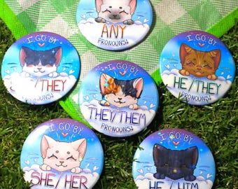 Pines de botón con pronombres de gatitos LGBT