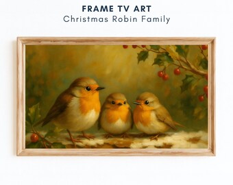 May include: A framed print titled "FRAME TV ART Christmas Robin Family." The artwork shows three robins with orange breasts and brown feathers on a branch with red berries and green leaves. The frame is a light brown colour.